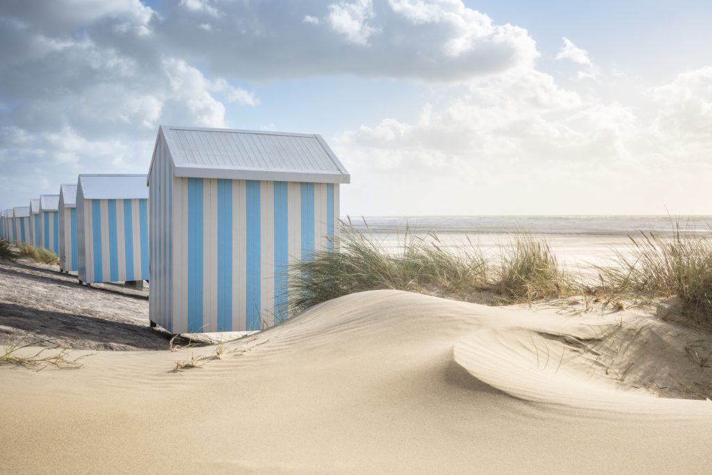 The blue and white beach cabins at Hardelot